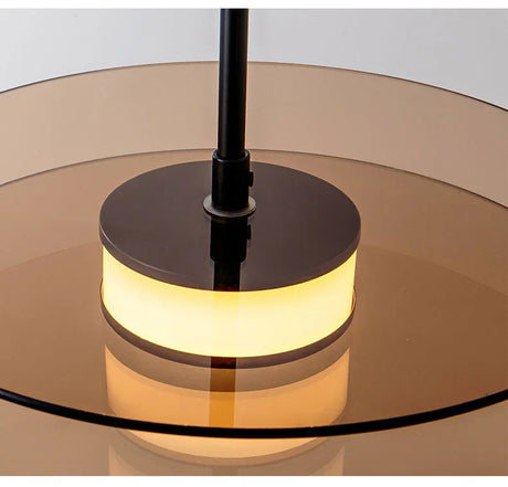 Close view of the opal ring held between the two glass discs