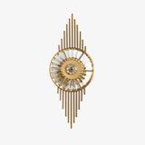 Wall sconce with a round crystal wheel set on a sunburst of slim gold rods