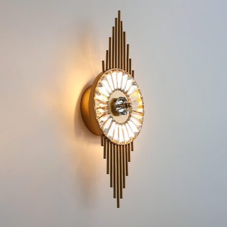 Side view of the lit sconce showing the round wall plate behind the wheel