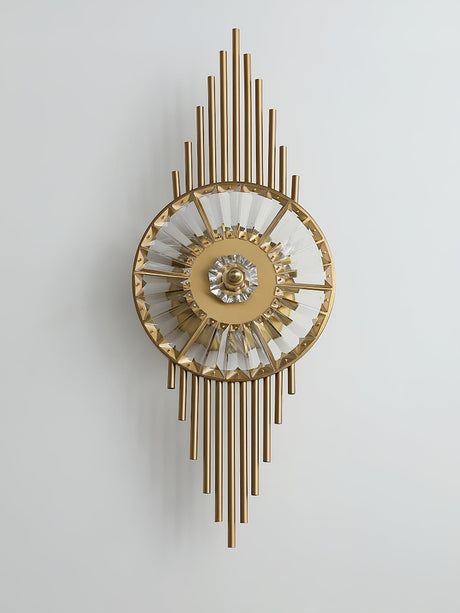The sconce on a pale gray background, the gold rods above and below the wheel