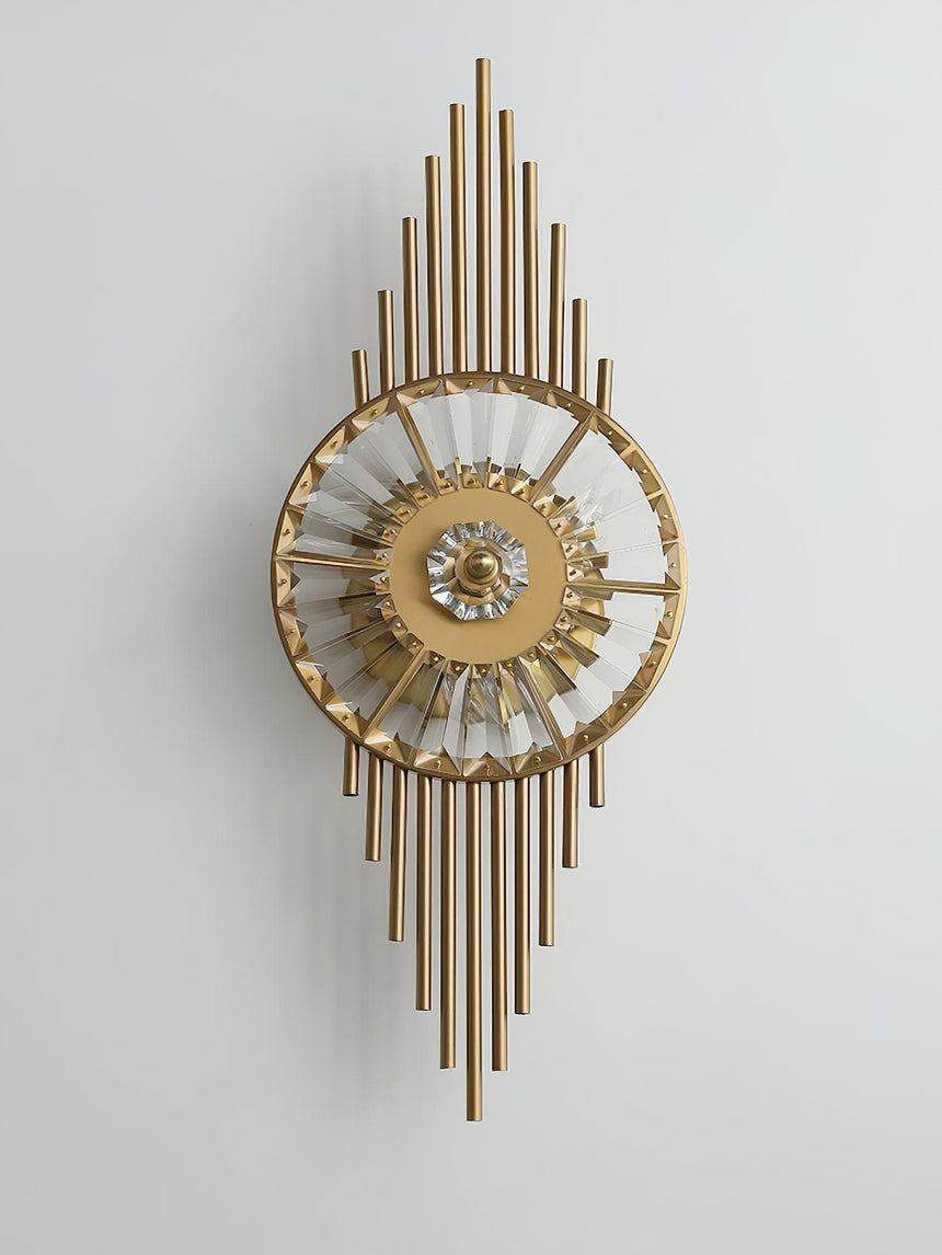The sconce on a pale gray background, the gold rods above and below the wheel