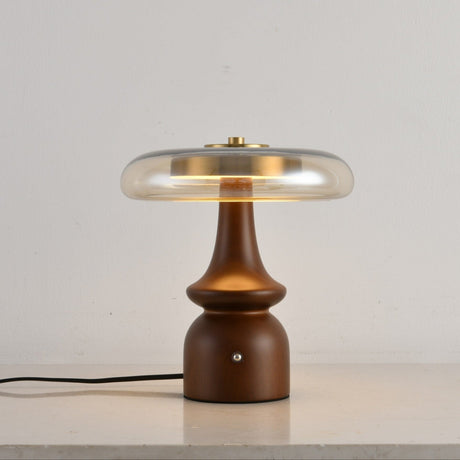 Clear glass table lamp on a stepped spindle base, plain ground