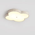 Standard 14.2 in cloud ceiling lamp lit, seen at an angle against a pale wall