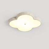 Cloud ceiling lamp lit straight on, the stone rim framing the white glass face