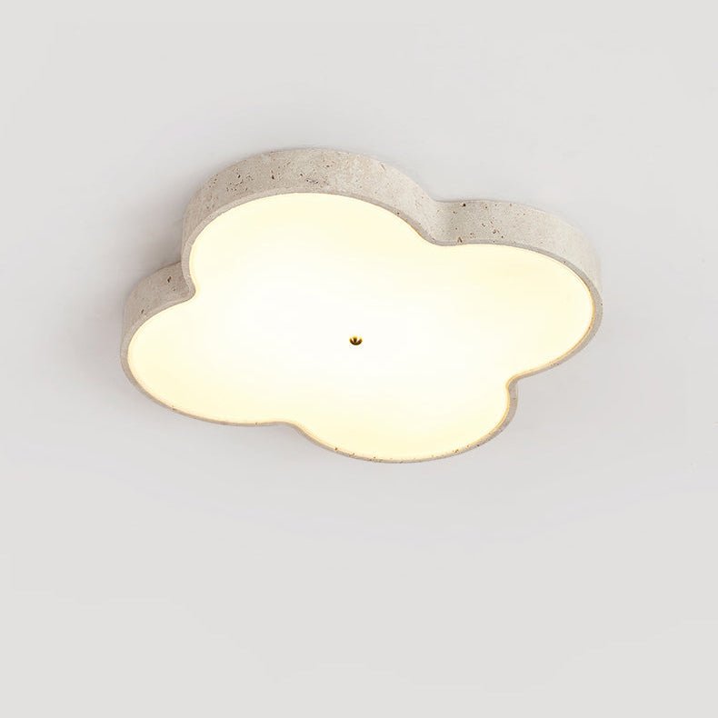 Large 20.9 in cloud ceiling lamp lit, seen at an angle against a pale wall
