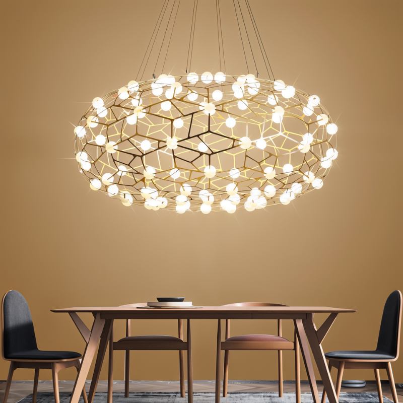 The lit cloud above a wooden dining table and chairs against an ochre wall