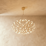 The small version, a shallow lattice disc carrying 48 lit globes