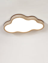 Lit cloud ceiling light showing the travertine band around the white acrylic face