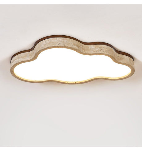 Cloud ceiling light lit flat against a white ceiling with the stone rim visible