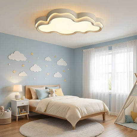 Cloud light fixture lit above a staircase landing with a handrail and a pale painted wall