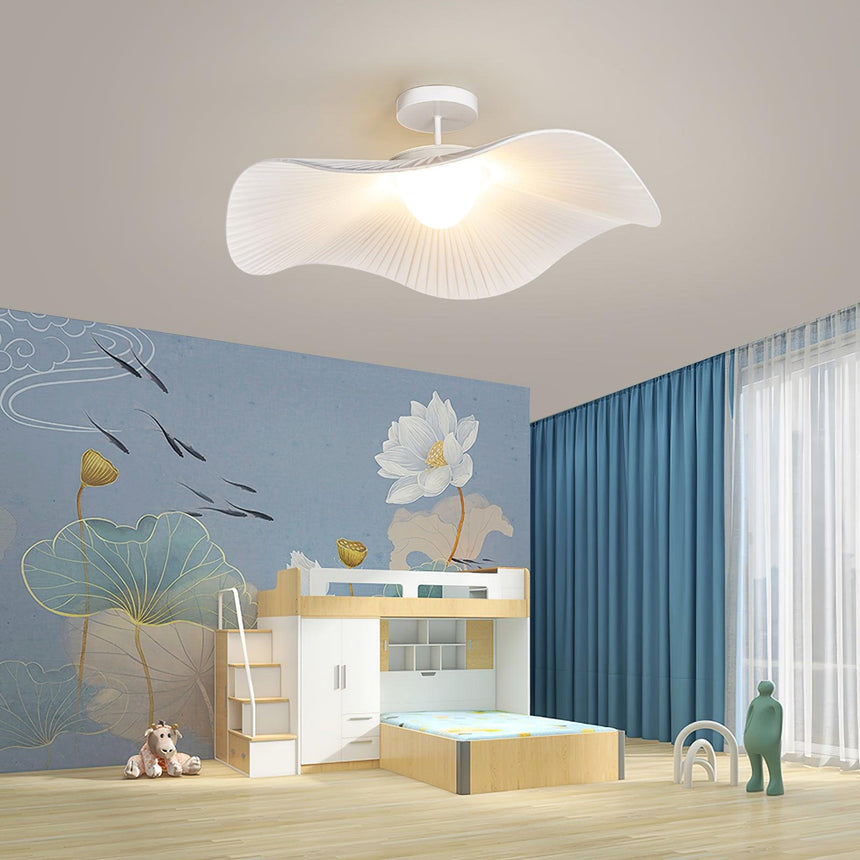 White fabric ceiling fixture in a child room with a blue wall and a painted lotus mural