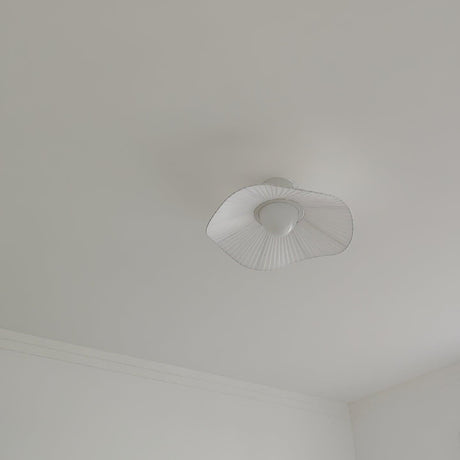 Unlit fabric wing ceiling fixture seen flat against a plain white ceiling