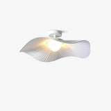 Lit fabric wing ceiling fixture shown from a low angle against a plain gray background