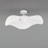 Fabric wing ceiling light seen from the side, unlit, showing the curve of the wings