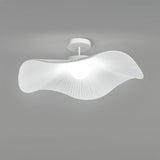 Unlit fabric wing ceiling fixture from a low side angle showing the pleated shade