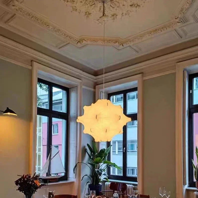 Cloud shade under an ornate plaster ceiling