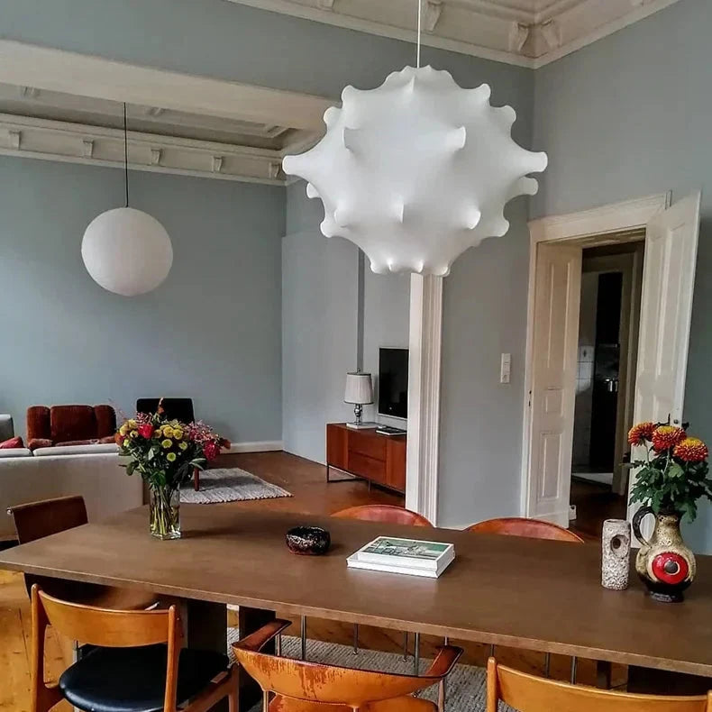 Cloud shade hung above a long dining table