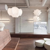 Two cloud shades hung in an open office