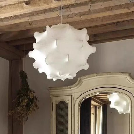 Layered imitation silk cloud shade hung in a pale room