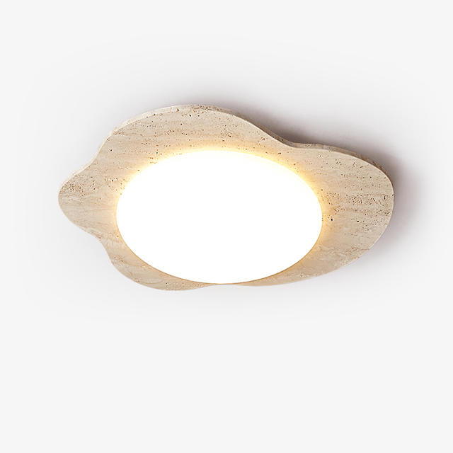 Cloud shaped ceiling light in yellow travertine with a round white diffuser, plain background