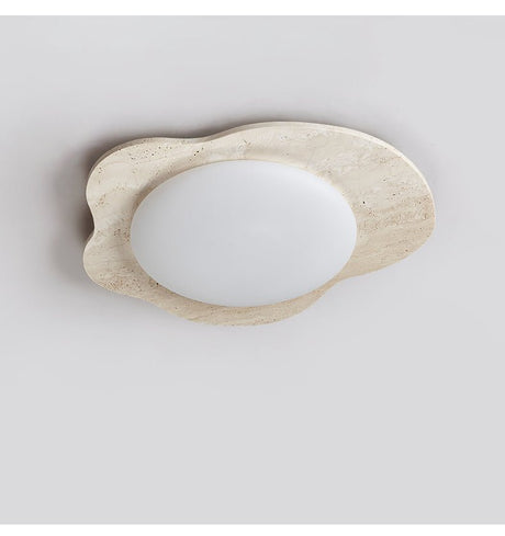 Unlit travertine cloud ceiling light showing the matte white lens against the stone