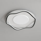 Black and white cloud shaped lamp seen from below, unlit, on a plain background