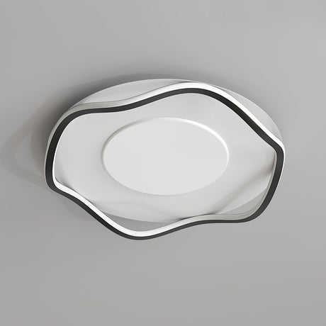 Black and white cloud shaped lamp seen from below, unlit, on a plain background