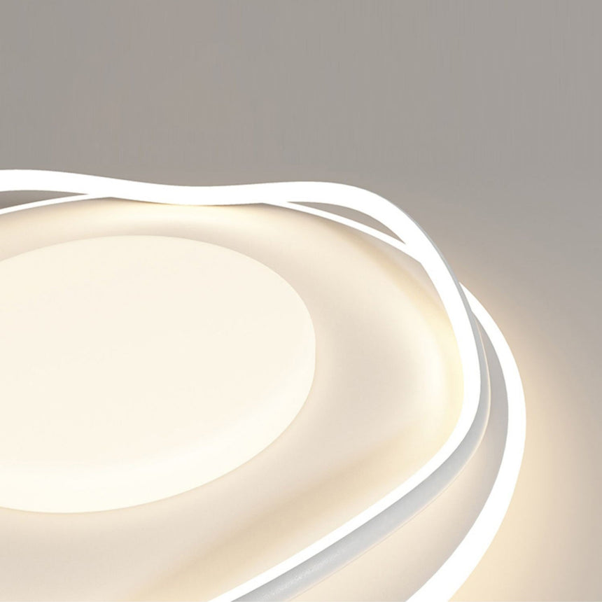 Close view of the lit acrylic shade and the layered irregular outline