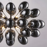 The cluster from underneath, showing how the shades gather around the lamp hub
