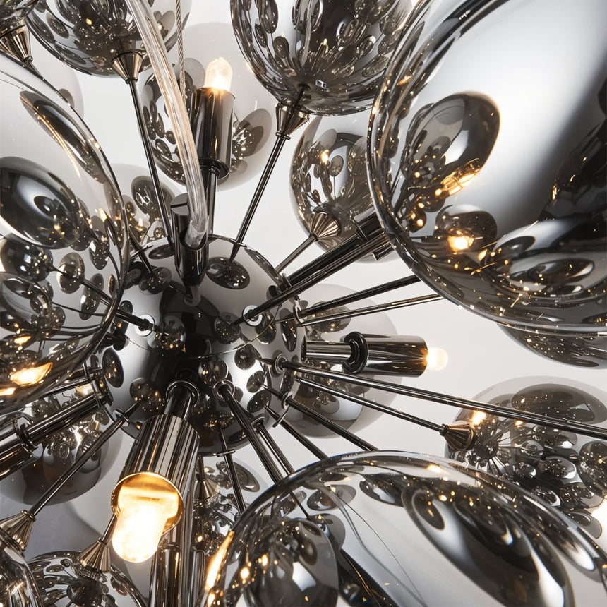 The central hub with its lamps visible between the mirrored ovoid shades