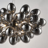 The ovoid shades massed close together, reflections running from one to the next