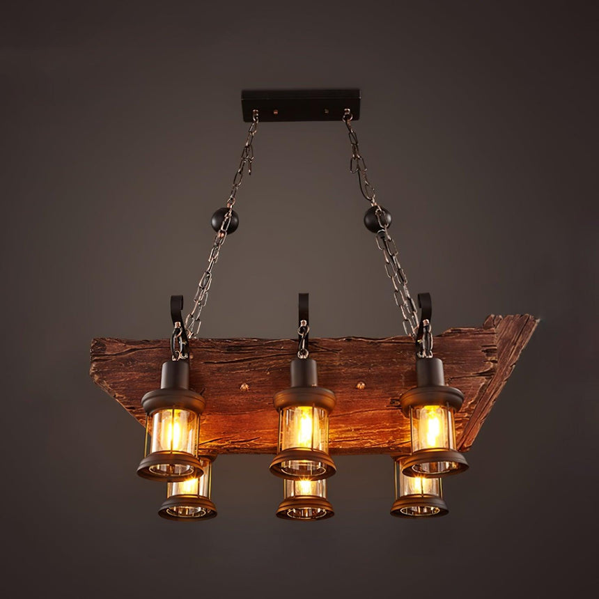 A straight wood plank carrying a row of glass lanterns on chains