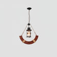 A single glass lantern slung under a curved wood hull section