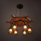 The wheel frame lit with six lanterns and iron hooks in view