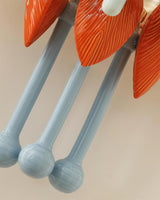 Close view of the pale blue ceramic rods ending in round beads