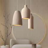 Tapered resin shades hung in front of a lit arch