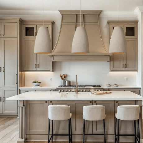 Row of tapered resin shades above a kitchen island