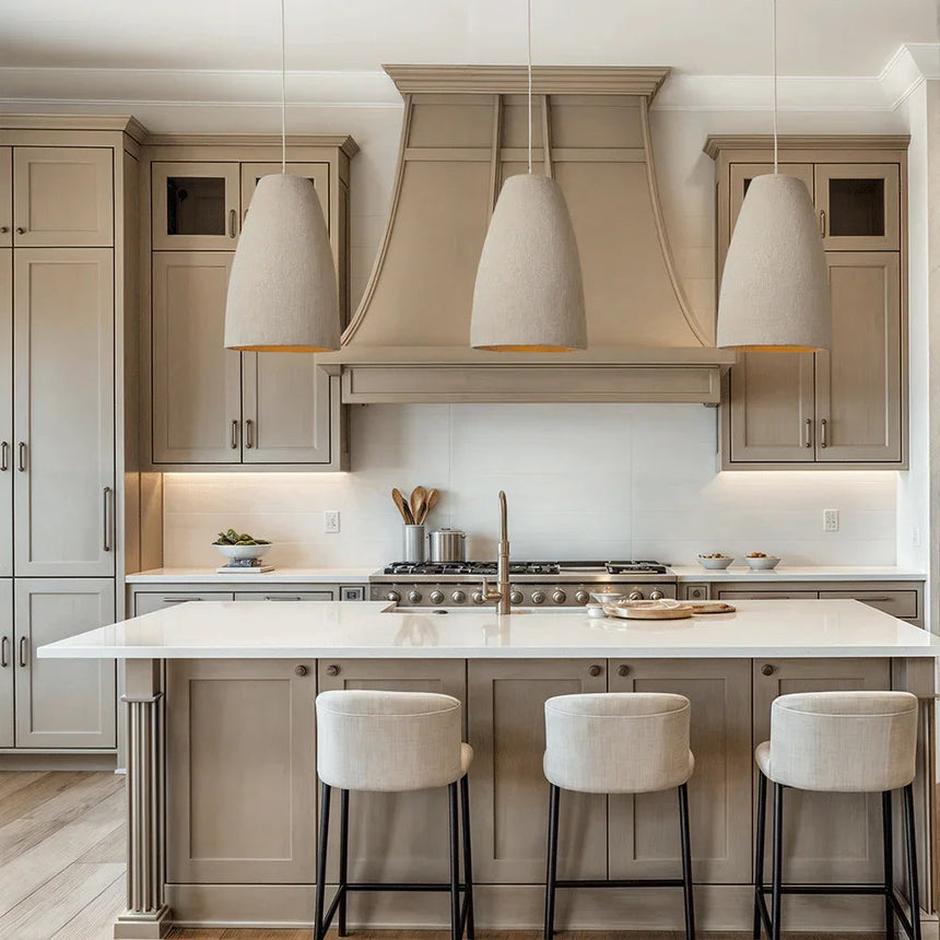 Row of tapered resin shades above a kitchen island
