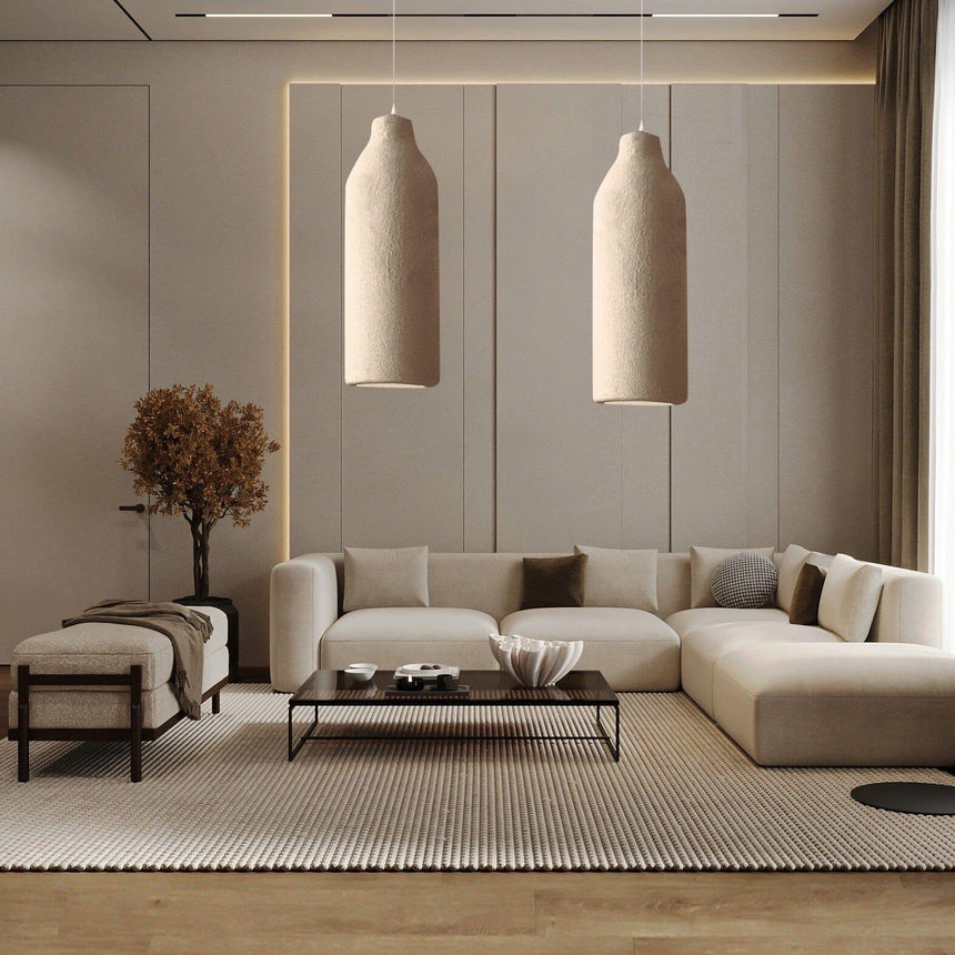 Pair of tapered resin shades in a wide living room