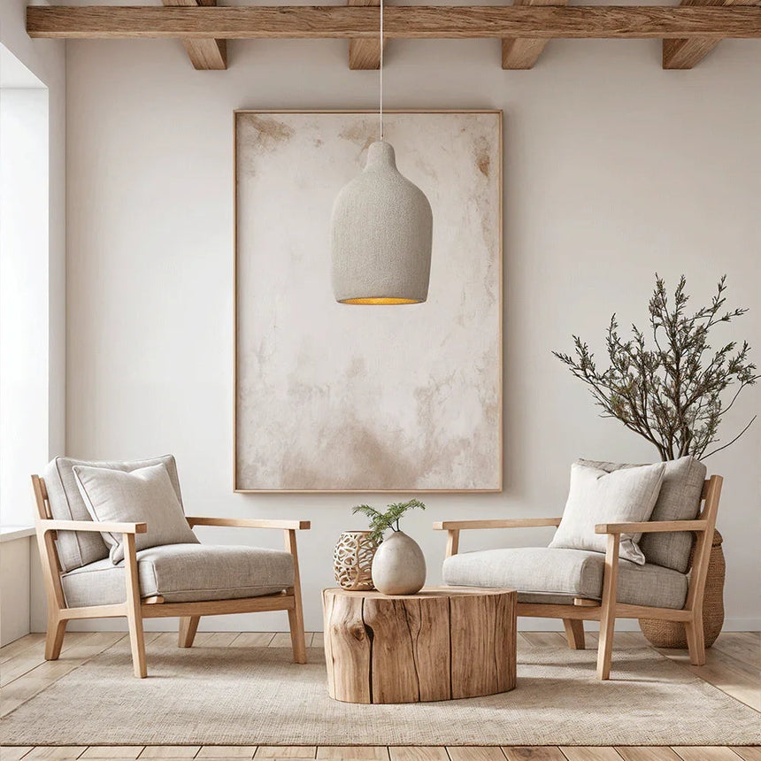 Wide tapered resin shade above two armchairs and a stump table