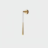 The brass finish on a pale gray background