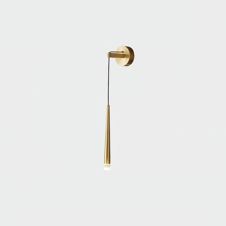 The brass finish on a pale gray background
