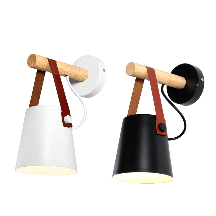 The white and the black cone shown side by side on their wood bars