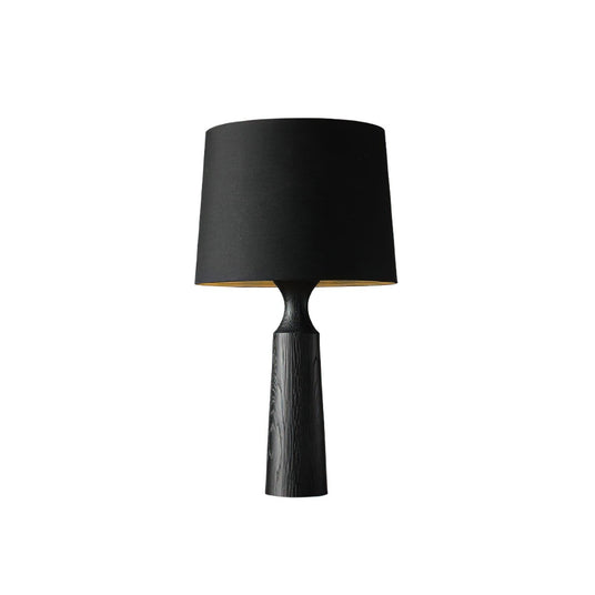 Console table lamp in black with a black shade, lit and plain
