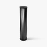 Fluted cylinder bollard in dark metal with a lit gap down the side