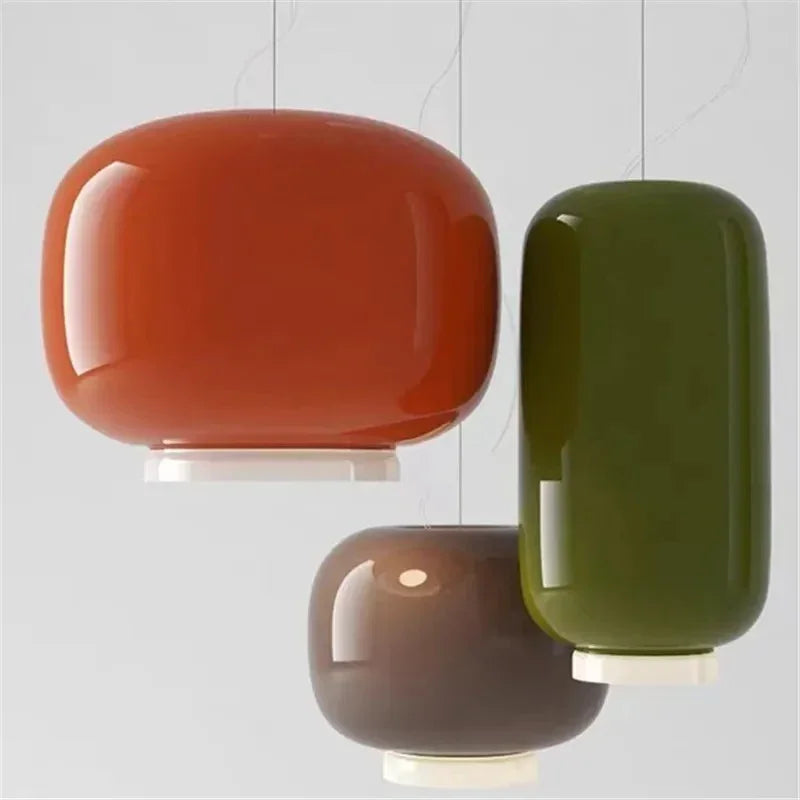 Orange, green and brown glass shades photographed together