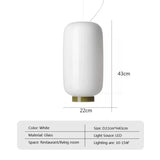 Tall white glass shade shown with its 22 by 43 cm dimensions