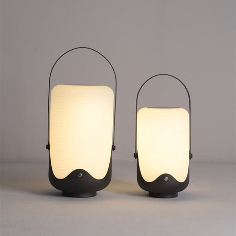 The two heights standing together, the arch handle raised on each body