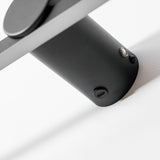 Close view of the round mount and the charging port on the back of the bar