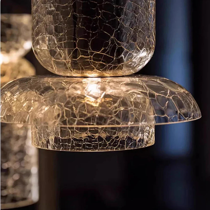 Close view of the cracked inner layer catching the light inside the glass